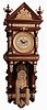 Reproduction, Ansonia "Hanging Antique" 8 day time and strike weight driven oak wall clock, late 20th century