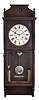 Seth Thomas Clock Co., Thomaston, Conn., "Flora" wall clock with a weight driven 8 day time and strike movement in a walnut case.