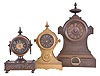 Clocks- 3 (Three): (1) American Clock Co., New York "Tucker Bronze", 30 hour, spring brass movement shelf clock. (2) Ansonia Brass & Copper Co., Ansonia, Conn. "Tucker No. 2", 30 hour, spring brass lever movement shelf clock. (3) American Clock Co., New York, "Tucker Bronze", 8 day, time and strike spring brass movement iron case shelf clock.