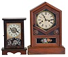 Clocks- 2 (Two): (1) William L. Gilbert Clock Co., Winsted, Conn., "Burl", 30 hour, time and alarm spring brass movement cottage clock, c1881 (2) New Haven Clock Co., New Haven, Conn., 30 hour, time and strike spring brass movement cottage clock, c1875