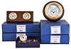 Clocks- 5 (Five) Chelsea Clock Company quartz movement clocks and desk sets, new / old stock in factory gift boxes: two #40- 137 "Cable Round Wall Clock"; desk set with pen on marble base; two #40136 "Cable Weather Station" with barometer on wood stand