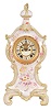 Ansonia Clock Co., New York, NY, 8 day, time and strike spring brass movement porcelain mantel clock.