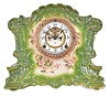 Ansonia Clock Co., New York, NY, "Romance", 8 day, time and strike spring brass movement porcelain mantel clock.