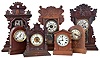 Clocks- 7 (Seven): (1) Waterbury Clock Co., Waterbury, Conn., 8 day, time, strike and alarm spring brass movement shelf clock, c1900 (2) New Haven Clock Co., New Haven, Conn., 8 day, time and strike spring brass movement shelf clock, c1890 (3) E. Ingraham & Co., Bristol, Conn., 8 day, time and strike spring brass movement shelf clock, c1890 (4) Ansonia Clock Co., New York, NY 8 day, time and strike spring brass movement cabinet series shelf clock, c1890 (5) Seth Thomas Clock Co., Thomaston, Conn., 8 day, time and strike spring brass movement round top mantel clock, c. 1910. (6) New Haven Clock Co., New Haven, Conn., 8 day, time and strike spring brass movement mantel clock, c1905 (7) Seth Thomas Clock Co., Thomaston, Conn., 8 day, time and strike spring brass movement beehive mantel clock, c1910