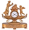 Leonard Rousset, a Paris, a gilt bronze figural mantel clock, the oblong base on engine turned feet with applied cast relief of Cupid and Psyche, supporting the lamp form clock case with figure of Venus casting Cupid's weapons into the fire, signed Roman numeral white enamel dial, blued steel Breguet style hands, 8 say time and strike pendule de Paris movement with silk thread suspension