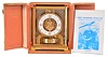 Jaeger- LeCoultre, Switzerland, Atmos clock, glazed, gilt brass case with presentation plaque, "Commodore O.C.S. Robertson, R.C.N. From Naval Attache's Association Washington, D.C. September, 1961", Arabic numeral and arrow marker white painted dial, gilt hands, cal. 526 movement, serial #133975, with original storage case, and a biography of Commodore Robertson