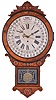 William L. Gilbert Clock Co., Winsted, Conn., "Office Drop Calendar", 8 day, spring brass movement calendar wall timepiece. The dial was made of three layers of thin paper covered metal disks. Gilbert made these with the calendar date ring to be advanced with a pin instead of the winding key in order to circumvent Gausha Maranville's patent.