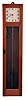 Gents of Leicester, England, C7 Pul- Syn- Etic master clock, mahogany case with glazed door, Arabic numeral white painted dial, and invar pendulum with cylindrical ball, the pendulum receiving impulse every thirty seconds from a falling gravity arm, as in the Synchronome master clocks