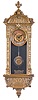 Rudolf Mayer, Germany, miniature Vienna style hanging regulator, cast brass ornamental case front attached to a wooden case with silvered beat scale, arch top with finial, back of top signed "Rud. Mayer Fec" and with his trade mark, glazed door with arched aperture, Roman numeral silvered dial with engraved, gilt center, the pendulum with matching decoration, blued steel hands, 8 day timepiece movement with dead beat escapement