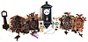Clocks- 8 (Eight) German / Black Forest and novelty wall clocks: four cuckoos, a miniature Vienna spring driven, a miniature New Haven banjo, a miniature cuckoo and grandfather clock and a moving eye novelty wall clock