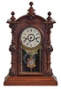 Welch, Spring & Co., Forestville, Conn., "Patti No. 1" shelf clock with a spring driven 8 day time and half hour strike movement in a rosewood case.