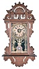 Seth Thomas Clock Co., Thomaston, Conn., "Eclipse" wall hanging clock with a spring driven 8 day time, strike and outboard alarm in a walnut case, c. 1890.