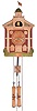 Lux "Town Hall" model, architectural case with Roman numeral dial and with bell in the tower, which swings as the clock strikes, 8 day weight powered time and strike movement, with scroll form weights, book and gavel pendulum, original label, and instruction sheet