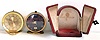 LeCoultre, Switzerland, two travel alarm clocks, one with red morocco case and convex dial, the other with red painted case and dial, both with lever escapements and alarms