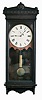Seth Thomas Clock Co., Thomaston, Conn., "Regulator No. 30" with an 8 day timepiece movement in a cherry case.