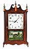 Robert B. Materne, Bristol, RI, 8 day, time and strike spring brass movement copy of an Eli Terry Pillar & Scroll shelf clock. Clock is numbered 163. Mr. Materne has been making fine reproduction clocks including this model for years. He now lives in Pawtucket, RI and maintains a Web site.