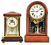 Clocks- 2 (Two): (1) Waterbury Clock Co., Waterbury, Conn., "Vendee", 8 day, time and strike spring brass movement wood and brass case crystal regulator c1908 (2) Ansonia Clock Co., New York, NY, 8 day, time and strike spring brass movement round top shelf clock, c1900