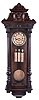 Gustav Becker, Freiburg, Germany, grand sonnerie hanging regulator, walnut case with turned and carved ornament, and frieze with blind fret, Arabic numeral silvered dial with gilt, engraved center, the pendulum, pulleys, and weights also engraved, and 8 day, 3 train movement