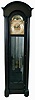 Herschede Hall Clock Co., Cincinnati, Ohio, "Pattern No. 86" hall clock, 8 day, time, strike and chime on 9 tubular bells, two brass weight driven movement in a mahogany case with full columns, beveled glass door and sides, arch top and resting on bun feet. The silvered brass dial has moon phase, spandrels, tune selector for Westminster or Whittington signed F.M. King JR, serial #3242