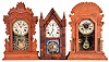 Clocks- 3 (Three): (1) New Haven Clock, New Haven, Conn., 8 day, time and strike spring brass movement Sharp Gothic or Steeple clock, c1875 (2) Waterbury Clock Co., Waterbury, Conn., 8 day, time, strike and alarm spring brass movement shelf clock. (3) William L. Gilbert Clock Co., Winsted, Conn., "Hawk", 8 day, time and strike spring brass movement shelf clock, c1891