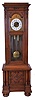 Germany, tall clock, 8 day, time and strike, two brass weight driven movement in a carved oak case, beveled glass door, cabinet in base on bun feet with engraved brass dial with white enamel chapter ring and matching engraved weights, pendulum and dial center