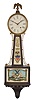 Seth Thomas Clock Co., Thomaston, Conn., "Banjo No. 1" hanging clock with a spring driven 8 day timepiece movement in a mahogany case with polished brass side ornaments.
