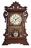 Seth Thomas Clock Co., Thomaston, Conn., "Newark" model, City Series shelf clock with an 8 day spring driven time and strike movement in a walnut case.