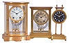 Clocks- 3 (Three): (1) English, 30 hour, weight brass movement gravity timepiece, c1925 (2) Seth Thomas Clock Co., Thomaston, Conn., "Empire No. 160" 8 day, time and strike spring brass movement crystal regulator mantel clock, c1925 (3) Seth Thomas Clock Co., Thomaston, Conn., "Empire 201", 8 day, time and strike spring brass movement crystal regulator mantel clock, c1907