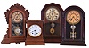 Clocks- 4 (Four): (1) Seth Thomas Clock Co., Thomaston, Conn., "Wales" shelf clock with a spring driven 8 day time and half hour strike movement in a golden oak case, c1904.. (2) Seth Thomas Clock Co., "Richmond V.P." shelf clock with a spring driven 8 day time and strike lyre movement in a rosewood veneered case, c1890. (3) F. Kroeber, New York, "Wasp" shelf clock with a spring driven 8 day time and strike movement in a walnut case, c1884. (4) Welch, Spring and Co. "Italian No. 2 V.P." shelf clock with a spring driven 8 day time and strike movement in a rosewood veneered case, c1880.