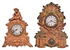 Clocks- 2 (Two): (1) Bristol Brass and Clock Co., New York, 8 day, time and strike spring brass movement cast spelter front shelf clock. Case No. 54 "Eagle" model, by Nicholas Muller, c1860 (2) Waterbury Clock Co., Waterbury, Conn., 8 day, time and strike spring brass movement cast spelter front shelf clock. Case No. 69 "Beggar" model by Nicolas Muller, c1872