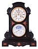 France, two dial mantel clock with Brocot's perpetual calendar, the black slate case with molded base, carved scrolls, red marble inlay, and gilt, incised foliate ornament, Roman numeral white enamel dial with visible Brocot escapement, blued steel Breguet style hands, white enamel calendar dial decorated with clouds and night sky with stars, surrounding a crescent shaped aperture through which the phases of the moon are seen, correct calendar hands, with 8 day, time and strike pendule de Paris movement