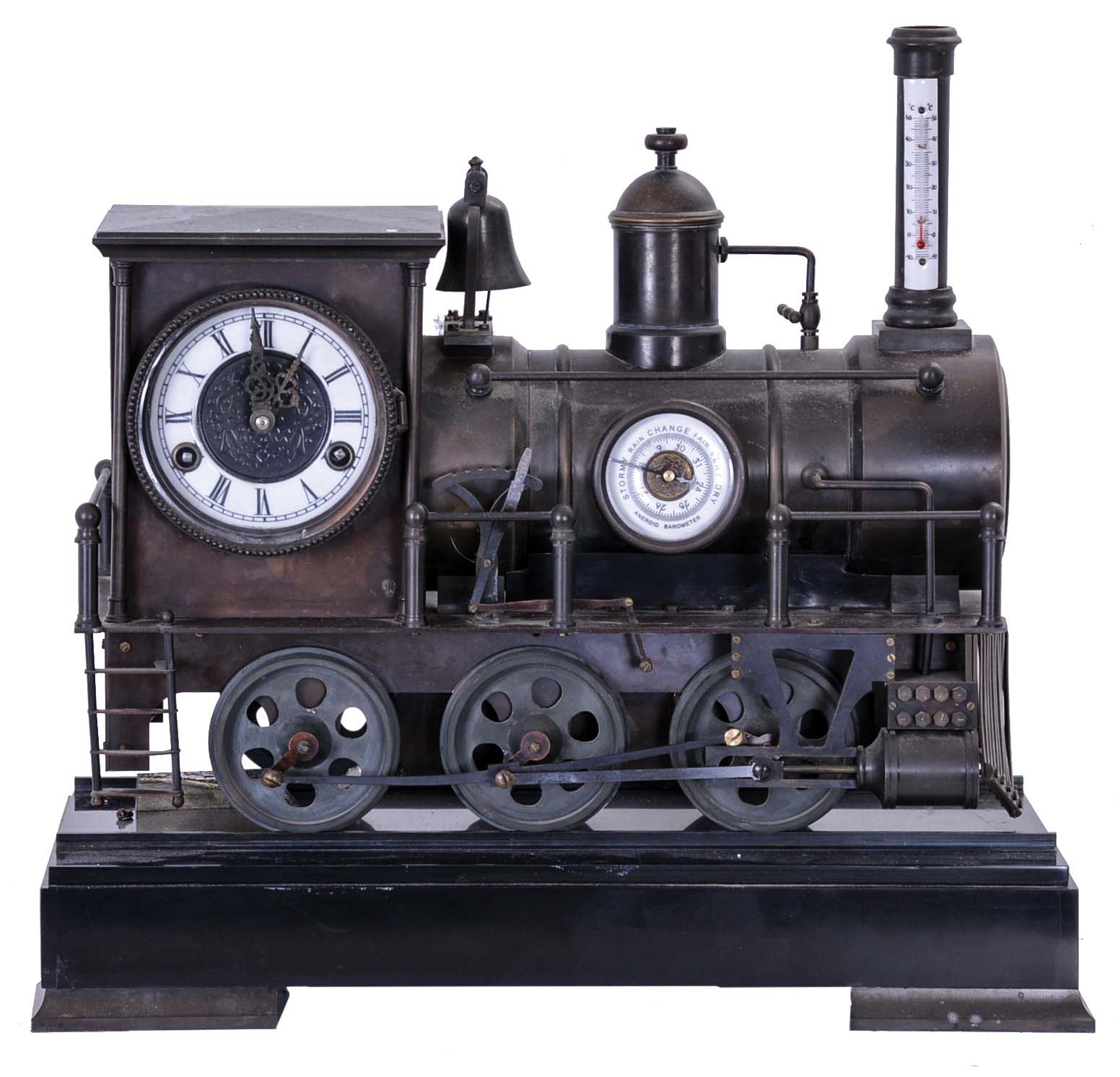 Reproduction Locomotive Clock: Detailed brass metal train model based on French Industrial series from the 1890s, time and strike clock with aneroid barometer and alcohol thermometer, all atop a black slate base with train track. Second spring driven movement in base is meant to power the wheels of the train. — Antique Clocks Price Guide