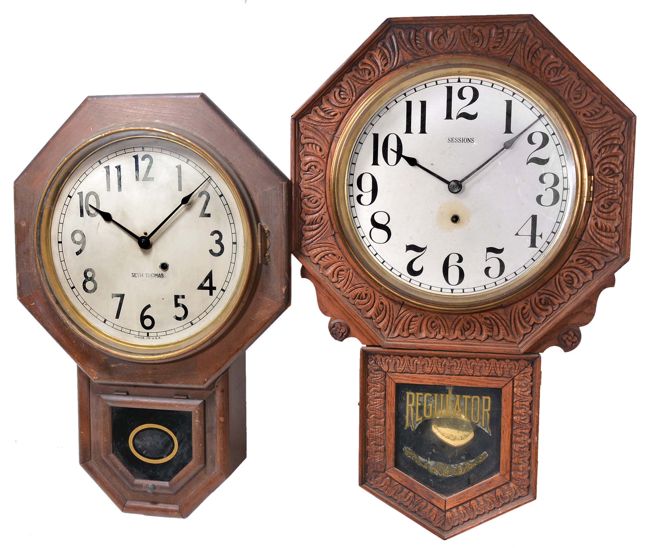 Clocks- 7 (Seven) American school house spring driven wall clocks including, Seth Thomas, Sessions, New Haven, Waterbury, Ansonia with advertising for "H.Z. Rhoads &amp; Son, Lancaster PA", etc. including one case only in pressed oak with bezel — Antique Clocks Price Guide