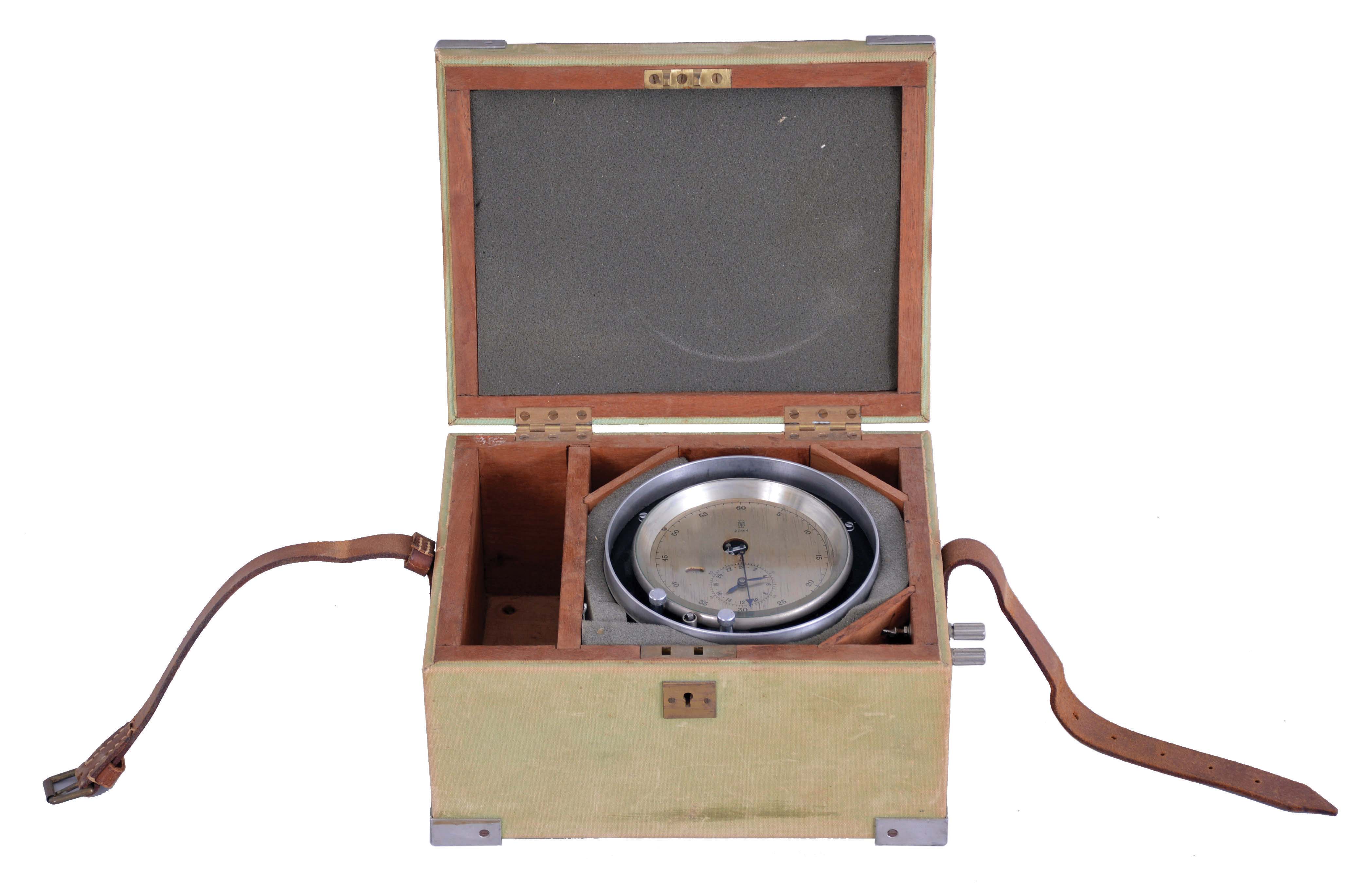Thomas Mercer Ltd., St. Albans, England, break circuit chronometer with mechanism for sending a signal at one minute intervals, 14 jewel, two day fusee movement with Z balance, and spring detent escapement, an auxiliary wheel mounted to the the fourth wheel arbor closing a pair of contacts for one second every minute, mounted to an aluminum plate, and contained in an aluminum canister silvered dial showing seconds on the outer ring, with subsidiary 24 hour chapter, blued steel hands, all contained in a fabric covered, wooden box with screw terminals, serial # 20914, mid 20th century — Antique Clocks Price Guide