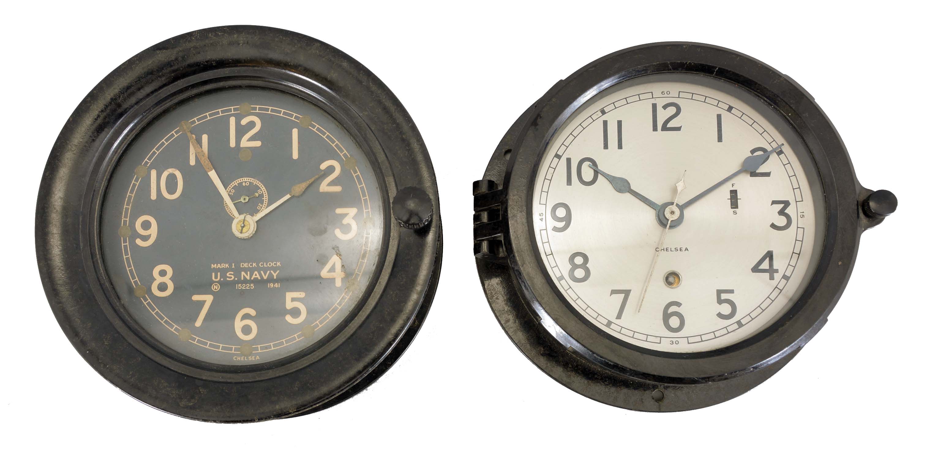 Clocks- 2 (Two). Deck Clocks: (1) Chelsea Clock Co., Boston, Mass., "U.S. Navy, Mark 1 Deck Clock", 8 day, time only, spring driven movement ship's deck clock in a black phenolic case, serial number 303718, dated 1941; (2) Chelsea Clock Co., Boston, Mass., 8 day, time only spring driven movement with center seconds, deck clock in a black phenolic case, serial number 423850, c1944, together with an incomplete Hamilton 22 chronometer and box. — Antique Clocks Price Guide