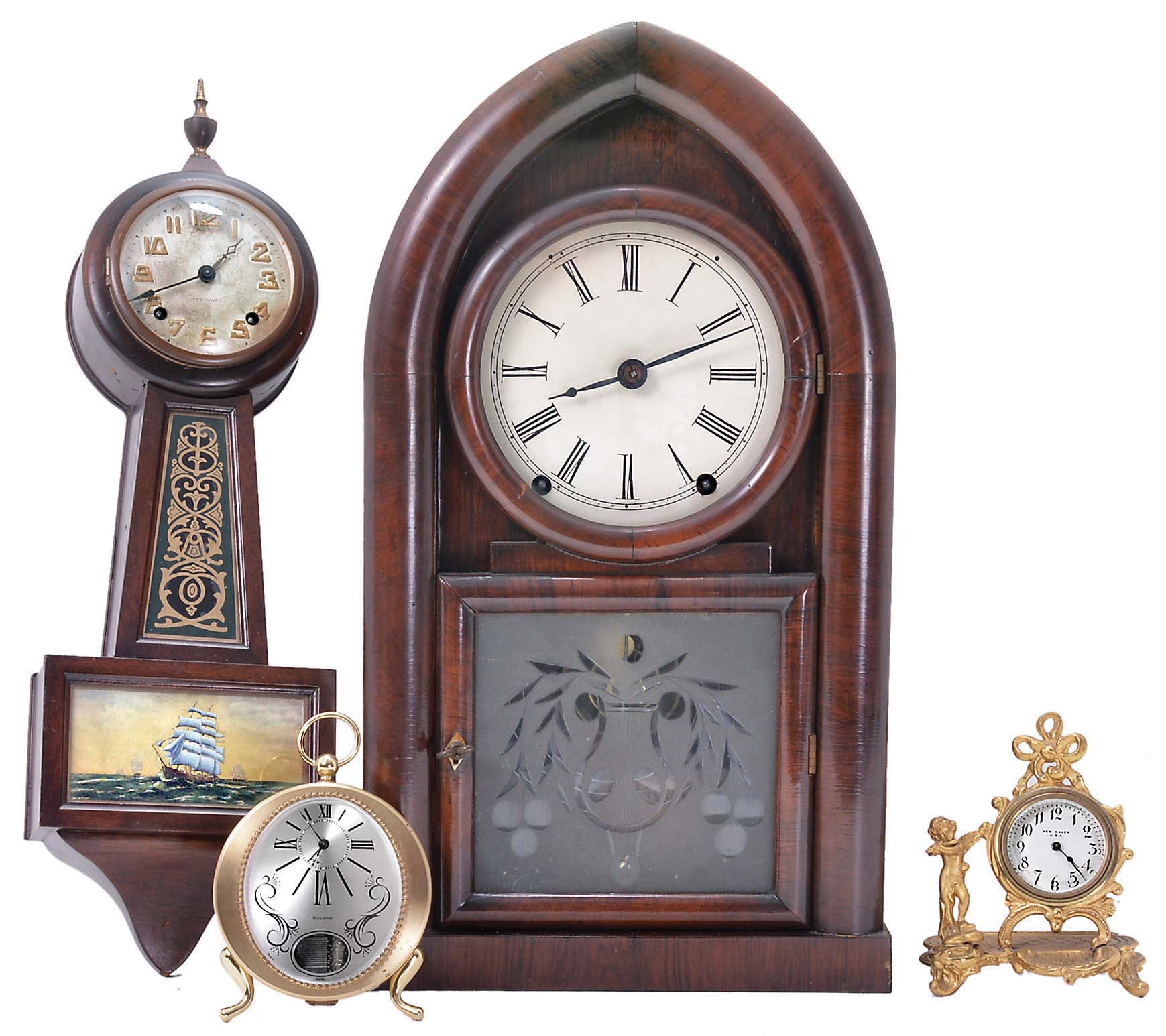 Clocks- 4 (Four): (1) Brewster &amp; Ingrahams, Bristol, Conn., "beehive", 8 day, time and strike with etched glass tablet; (2) New Haven "Winetka" miniature banjo; (3) New Haven figural desk clock; (4) Bulova musical alarm, c1975 — Antique Clocks Price Guide