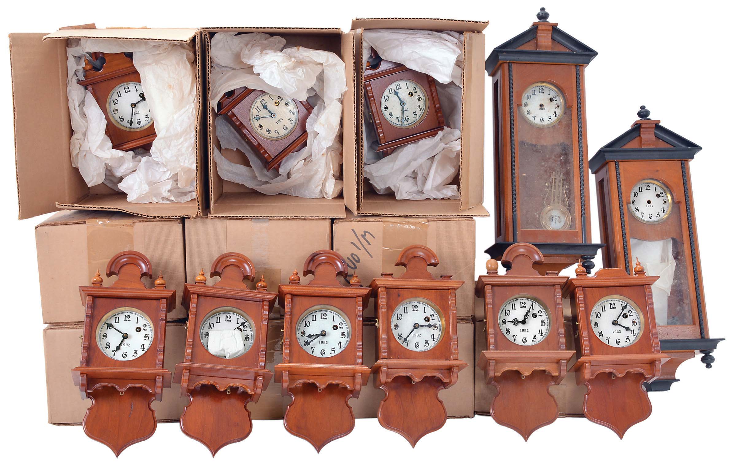 Clocks- 16 (Fifteen) miniature free swinger reproduction timepieces signed "R.K. - W.M." dated 1982; 2 (Two) Vienna reproduction regulator cases only, dated 1981; These were produced in limited numbers by William Mather in Ohio. Cherry wood cases with German movements. This recently discovered trove has the model labels on the back, but were never numbered as part of the limited edition — Antique Clocks Price Guide