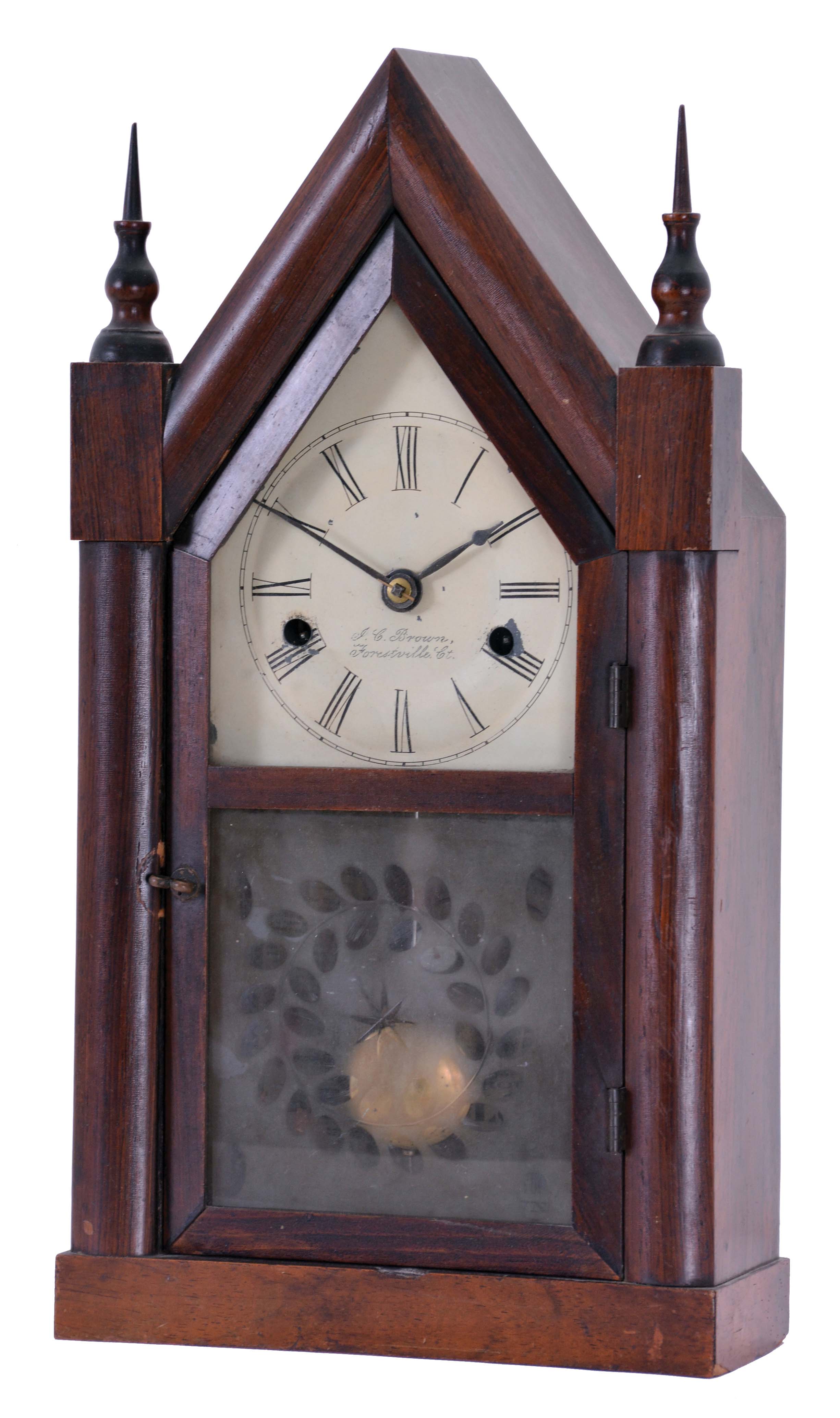 J. C. Brown, Forestville Manufacturing Co., Bristol, Conn., miniature steeple shelf clock with a 30 hour spring driven time and strike movement in a mahogany veneered case. Signed 30-hr time and strike movement. — Antique Clocks Price Guide