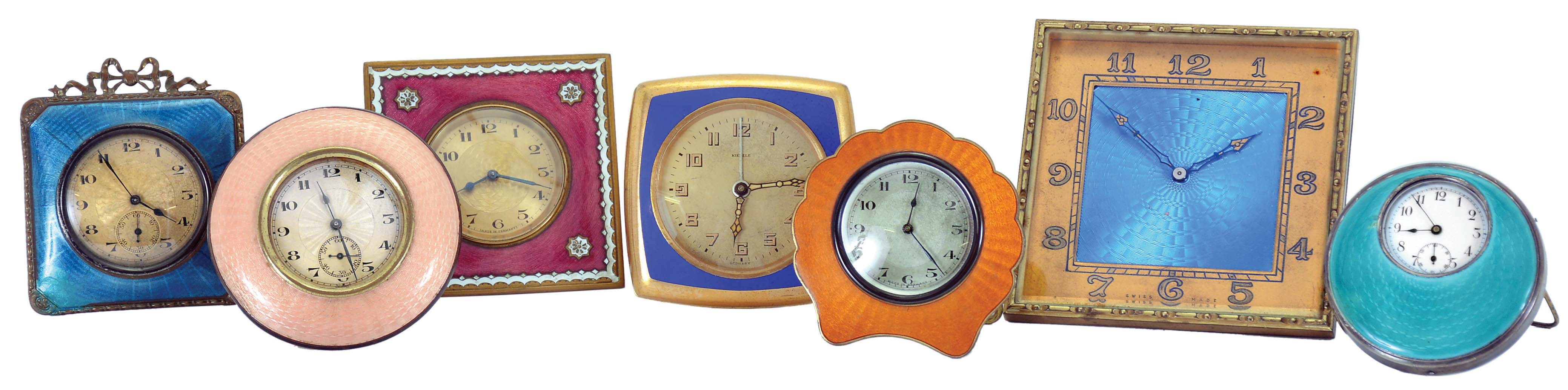 Clocks- 7 (Seven): All with easel backs, six decorated with guilloche enamel, the last in plain blue enamel, 30 hour and 8 day timepiece movements, 20th century, dimensions of largest clock listed — Antique Clocks Price Guide