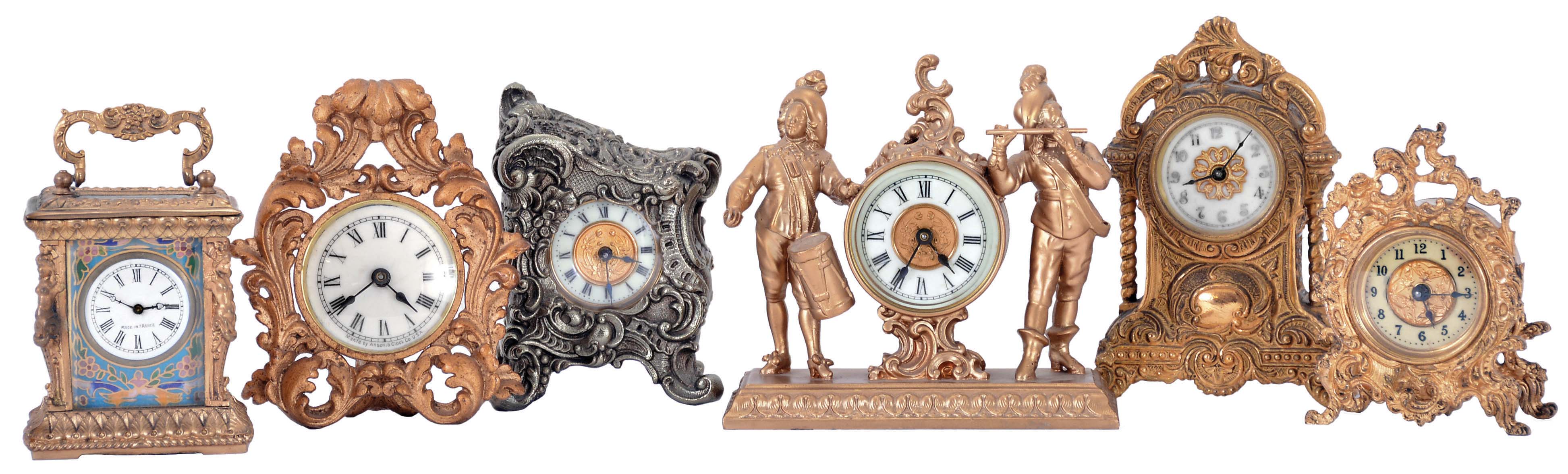 Clocks- 6 (Six): including a figural with fife and drummer, a French carriage with caryatid corners and champleve enamel dial mask, an Ansonia novelty, a British United novelty, and two other novelties with fancy cases — Antique Clocks Price Guide