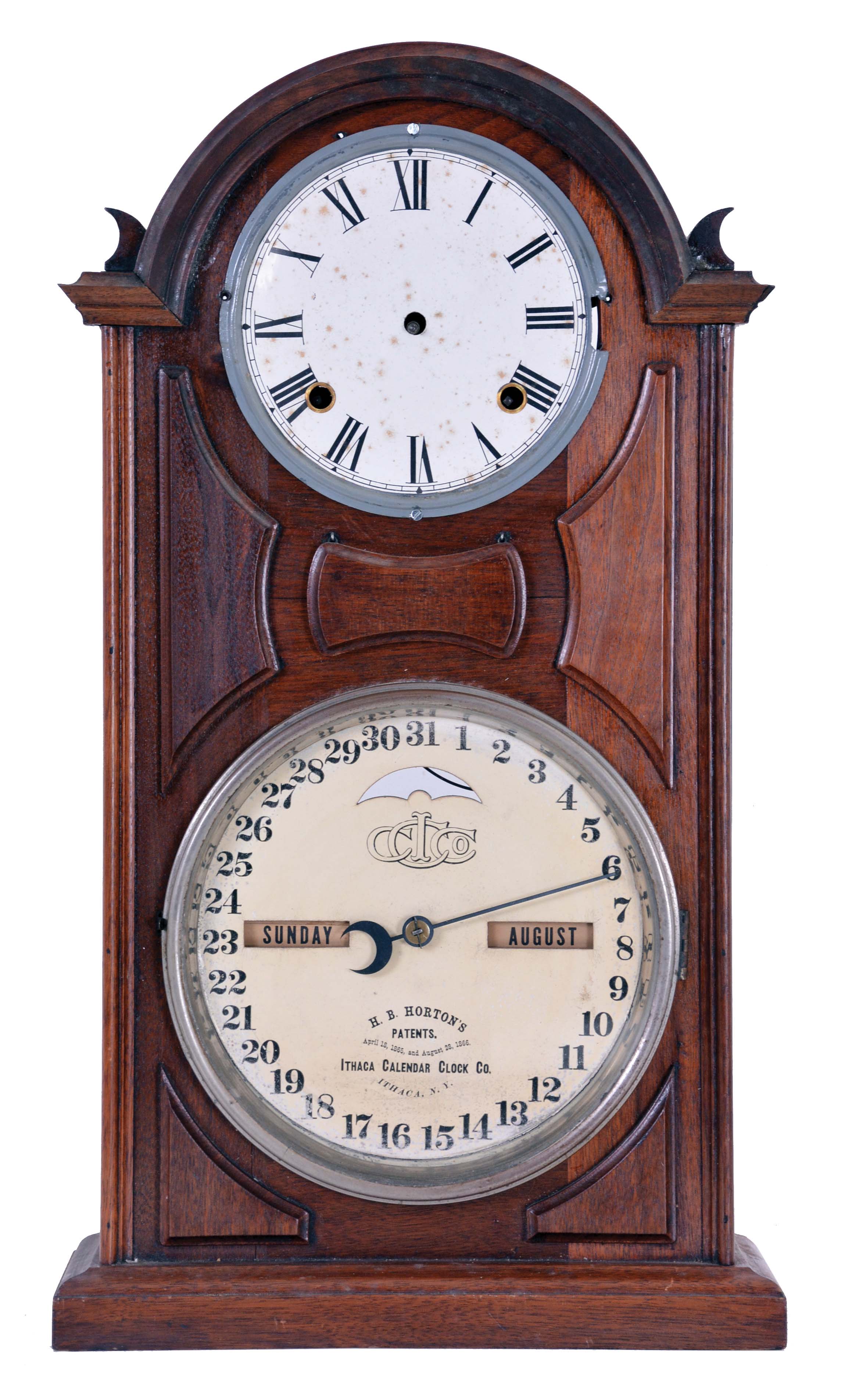Ithaca Calendar Clock Co., Ithaca, NY, "No. 8 Shelf Library" with a spring driven, 8 day, time and strike movement and a perpetual calendar mechanism in a walnut case. — Antique Clocks Price Guide