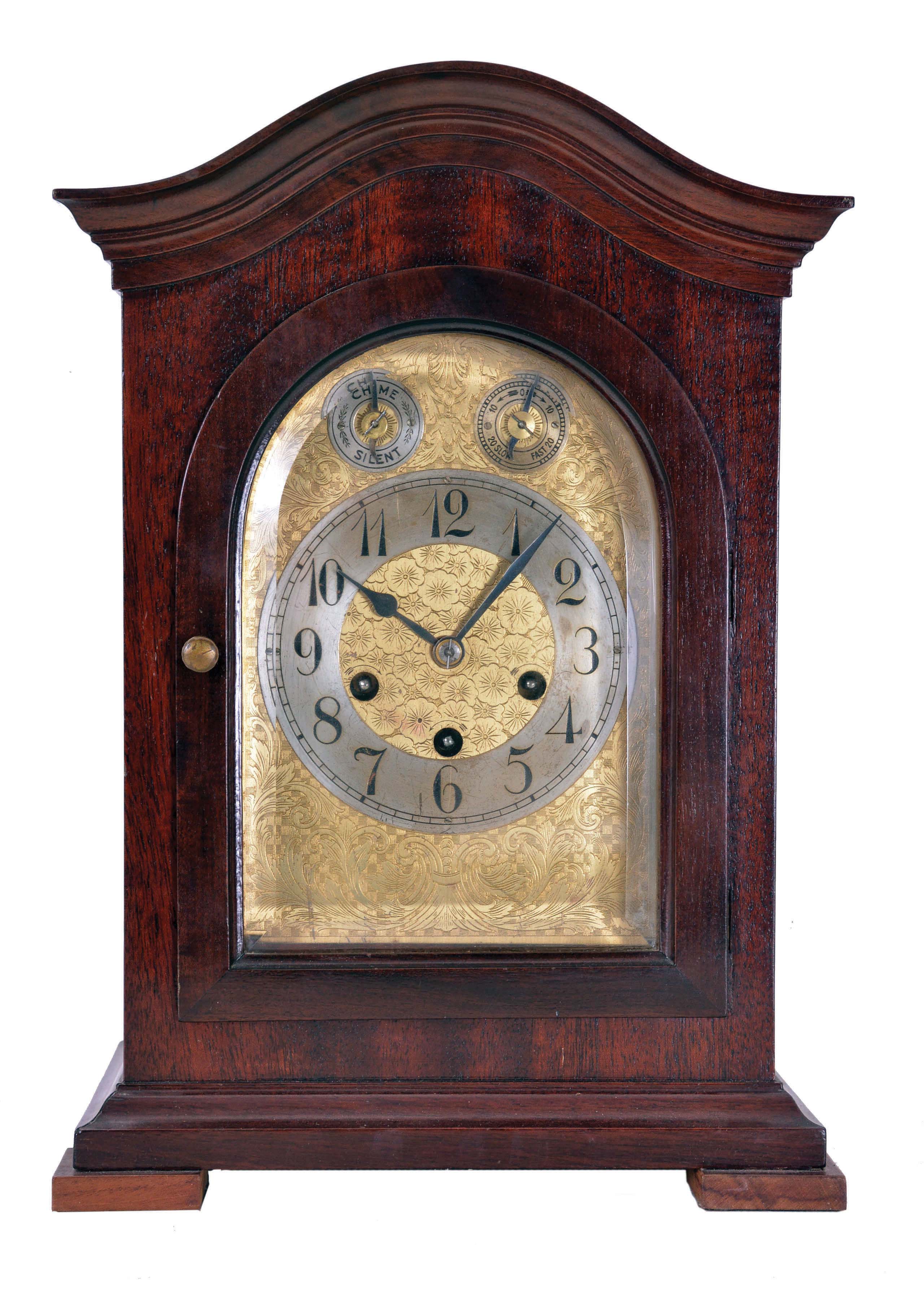 Junghans, Germany, 8 day spring driven movement, three train Westminster chime bracket clock with a B10 movement in a mahogany case. The clock chimes the quarters on 4 rods, while the hour is struck on a separate deeper toned rod. — Antique Clocks Price Guide