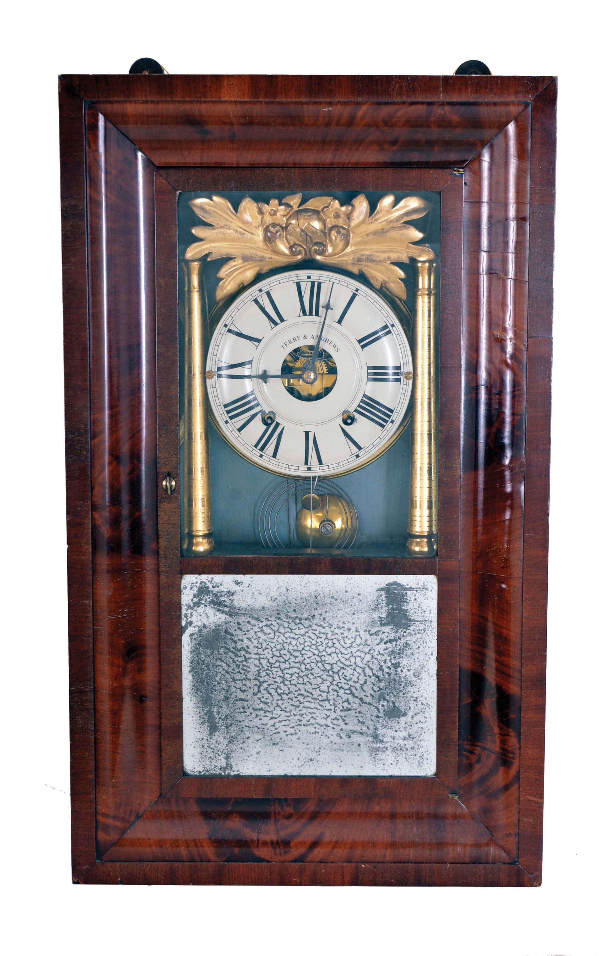 Terry &amp; Andrews, Bristol, Conn., 8 day, time and strike, weight driven brass movement, column OG shelf clock. This clock usually seen with a Joseph Ives or Hills, Goodrich &amp; Co. label. Joseph Ives designed the movement. — Antique Clocks Price Guide