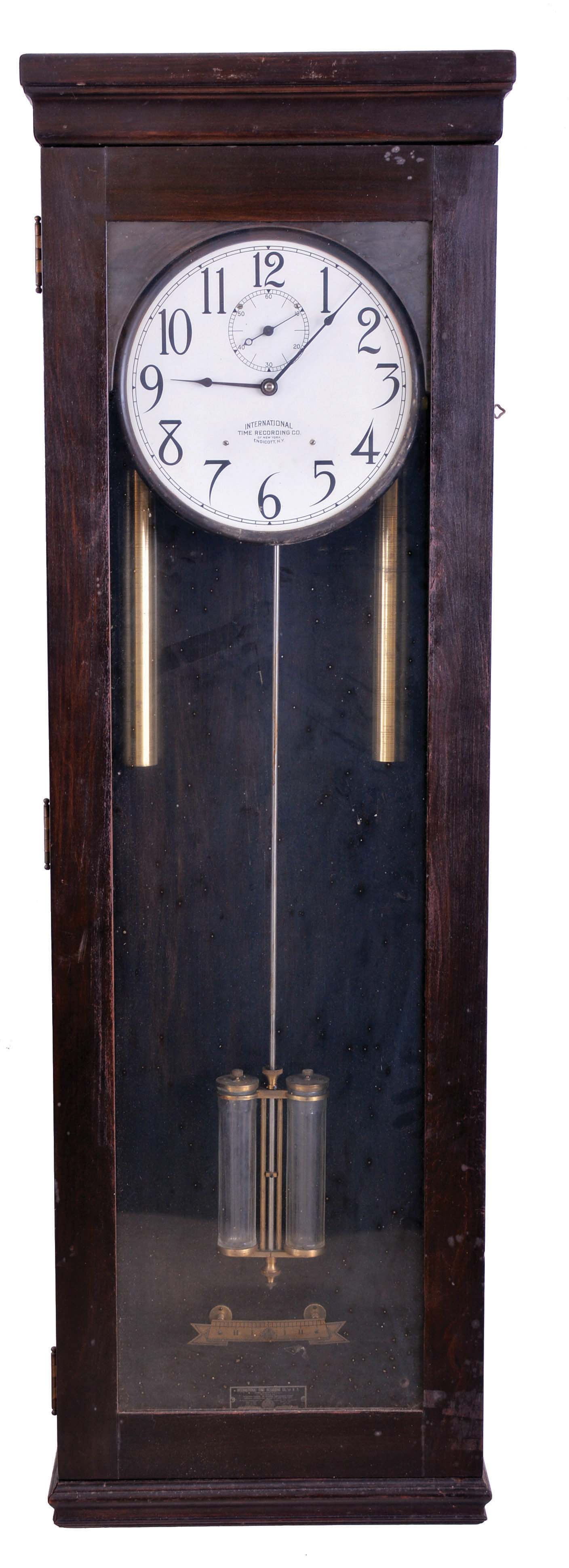 International Time Recording Co., Endicott, New York, "Model No. 16-2" wall hanging master clock, 8 day, time only, weight driven movement with two jar mercury pendulum, in a dark finished wooden case with painted metal dial, serial #425576 — Antique Clocks Price Guide