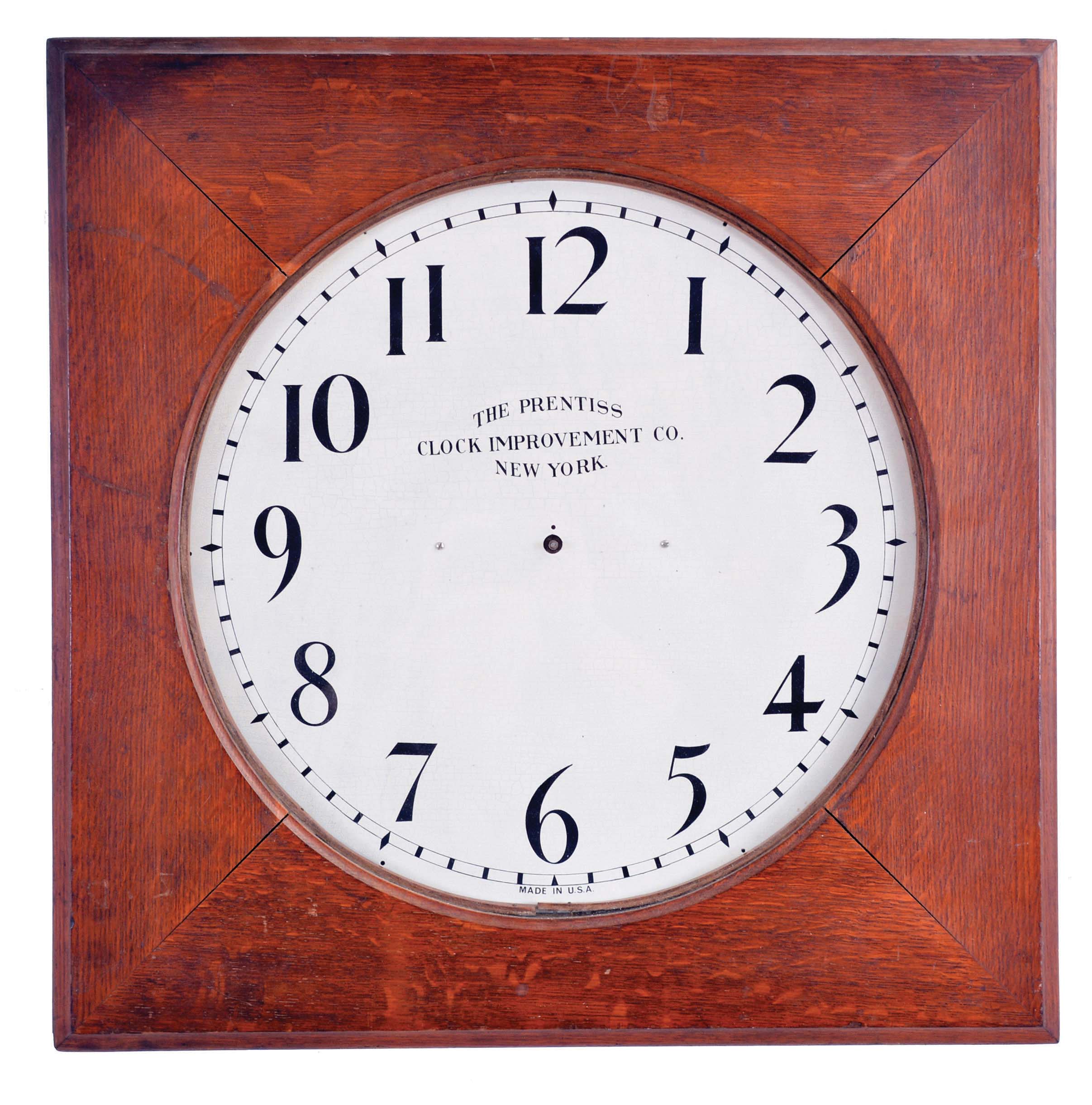 Clocks- 2 (Two) Slave Clock and Clock Case: (1) The Prentiss Clock Improvement Co., New York, "Mill Gallery" slave clock, with 18 inch painted metal dial in an oak case, c1900; (2) Unsigned, possibly Self Winding Clock Co., New York, gallery clock case (only) with 16 inch opening in a dark oak case, c1900. — Antique Clocks Price Guide
