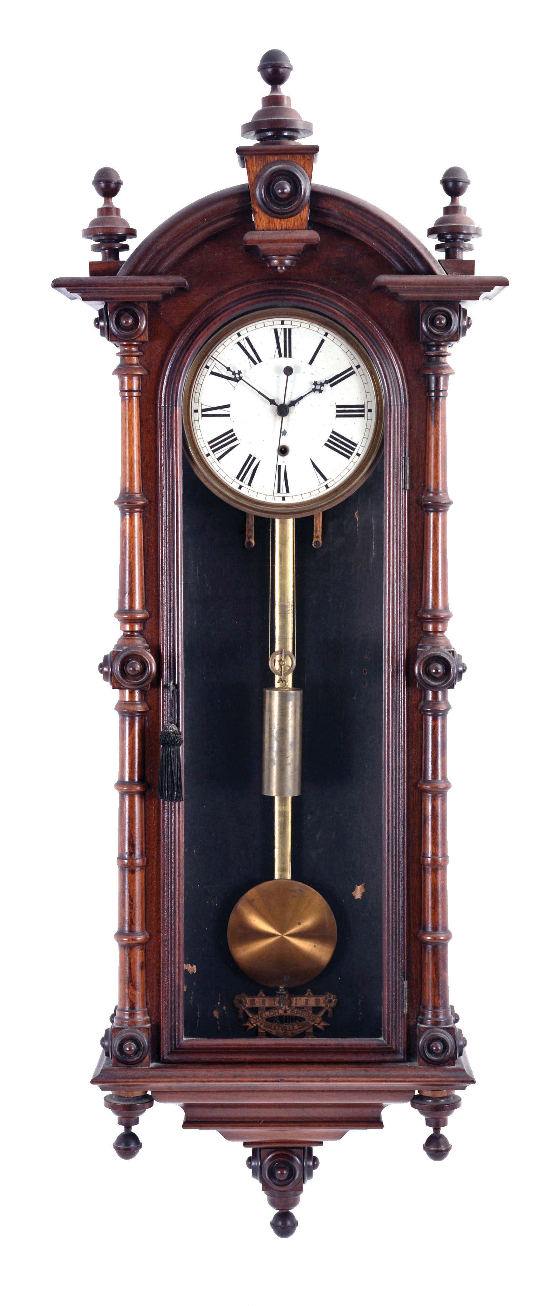 Welch, Spring &amp; Co., Forestville, Conn., "Regulator No. 7" or often called the wall "Patti", walnut case with a profusion of turned ornament and flocked paper interior, Roman numeral painted dial, blued steel hands, 8 day, weight driven brass timepiece with sweep seconds, pendulum with gilt rod — Antique Clocks Price Guide