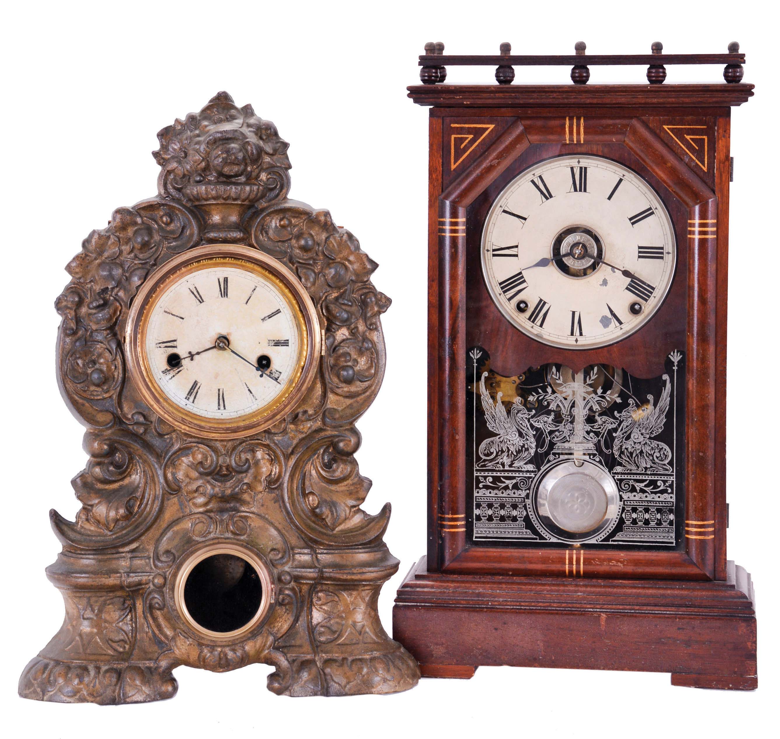 Clocks- 2 (Two): (1) Seth Thomas Clock Co., Thomaston, Conn., "Omaha", 8 day, time and strike spring driven movement city series shelf clock, c1887; (2) American Clock Co., New York, New York, 30 hour, time and strike spring driven movement iron front shelf clock, c1850 — Antique Clocks Price Guide