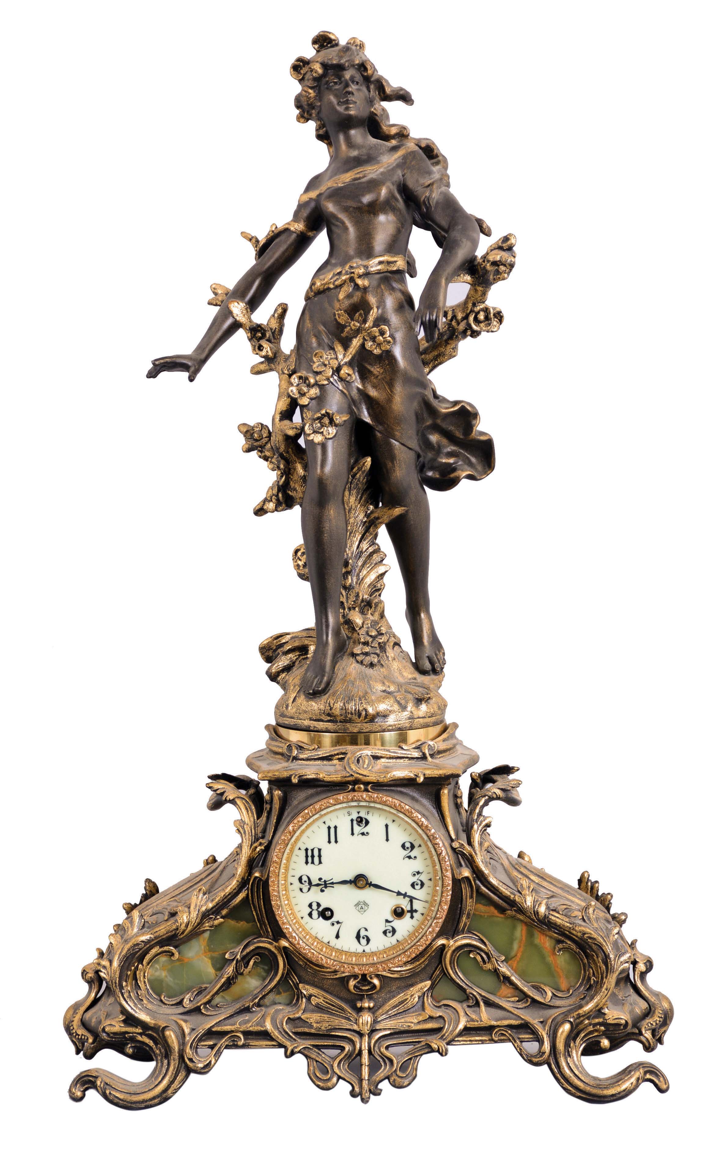Ansonia Clock Co., New York, NY, "Etruria and Blossom" figural mantel shelf clock with a spring driven, 8 day time and half hour strike movement in a cast metal case. — Antique Clocks Price Guide