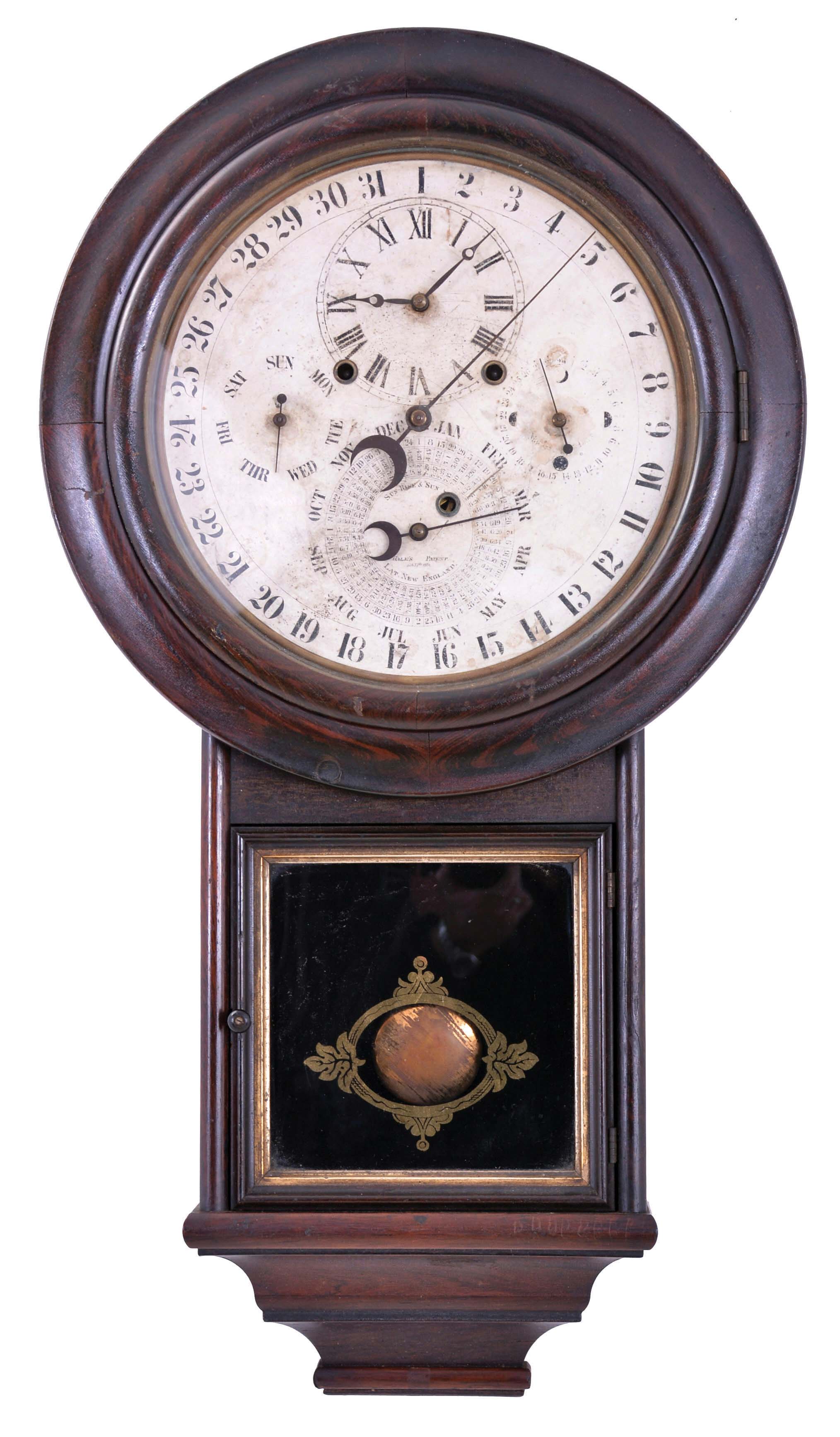 Welch, Spring &amp; Co., Forestville, Conn., "Gale Drop Calendar Model No. 2" wall clock, case grained to simulate rosewood, turned wooden bezel, door with reverse painted tablet, and complex molded base, paper dial on metal pan, 8 day, time and strike, spring driven brass movement with Daniel J. Gale's patent perpetual calendar — Antique Clocks Price Guide