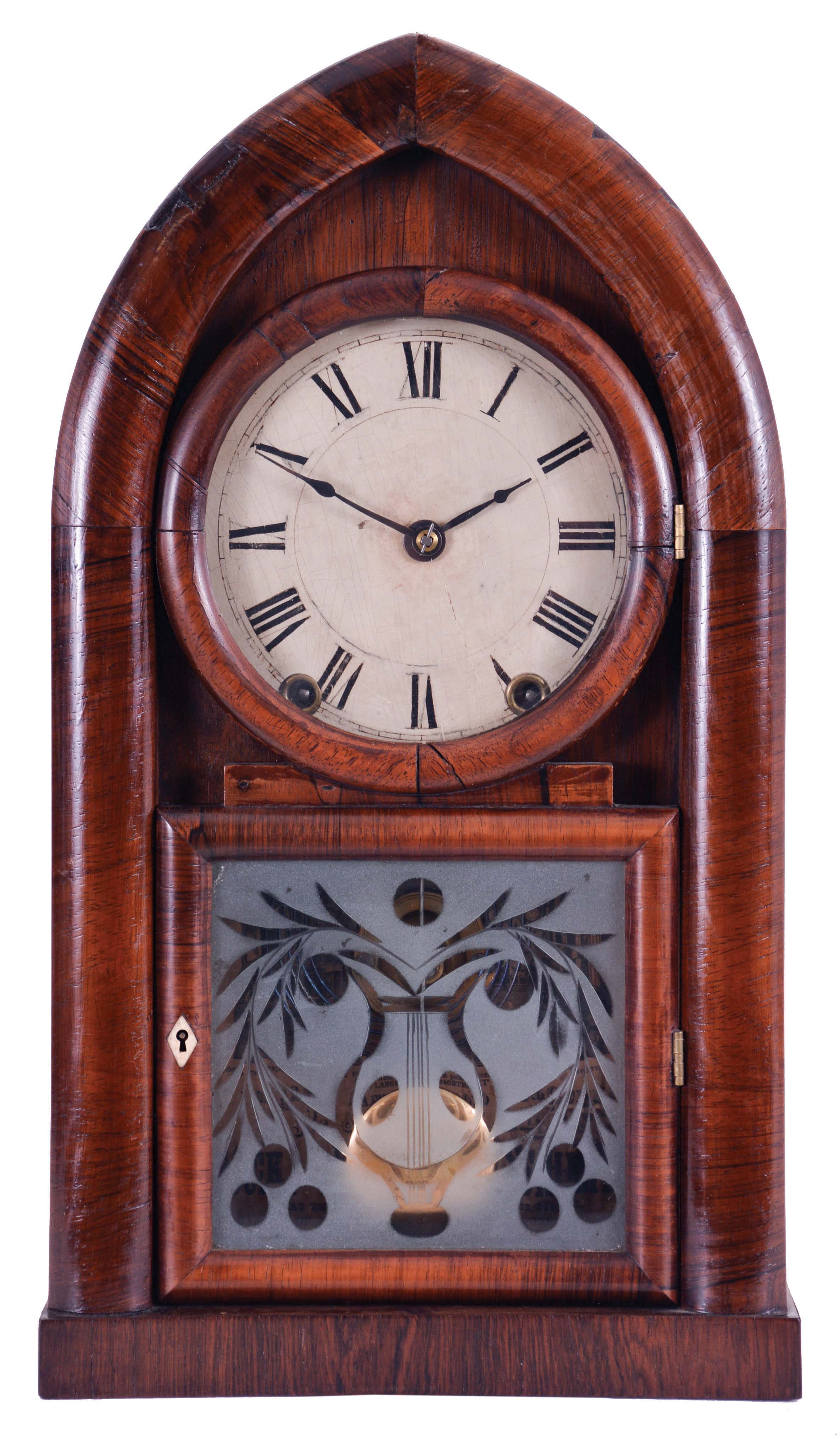 J. J. Beals, Boston, Mass. (Brewster &amp; Ingrahams, Bristol, Conn.) 8 day, time and strike spring driven movement Round Gothic or beehive shelf clock. This is a rack striking movement with the springs contained in cast iron cups. — Antique Clocks Price Guide